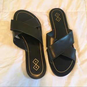 Black slide on sandals